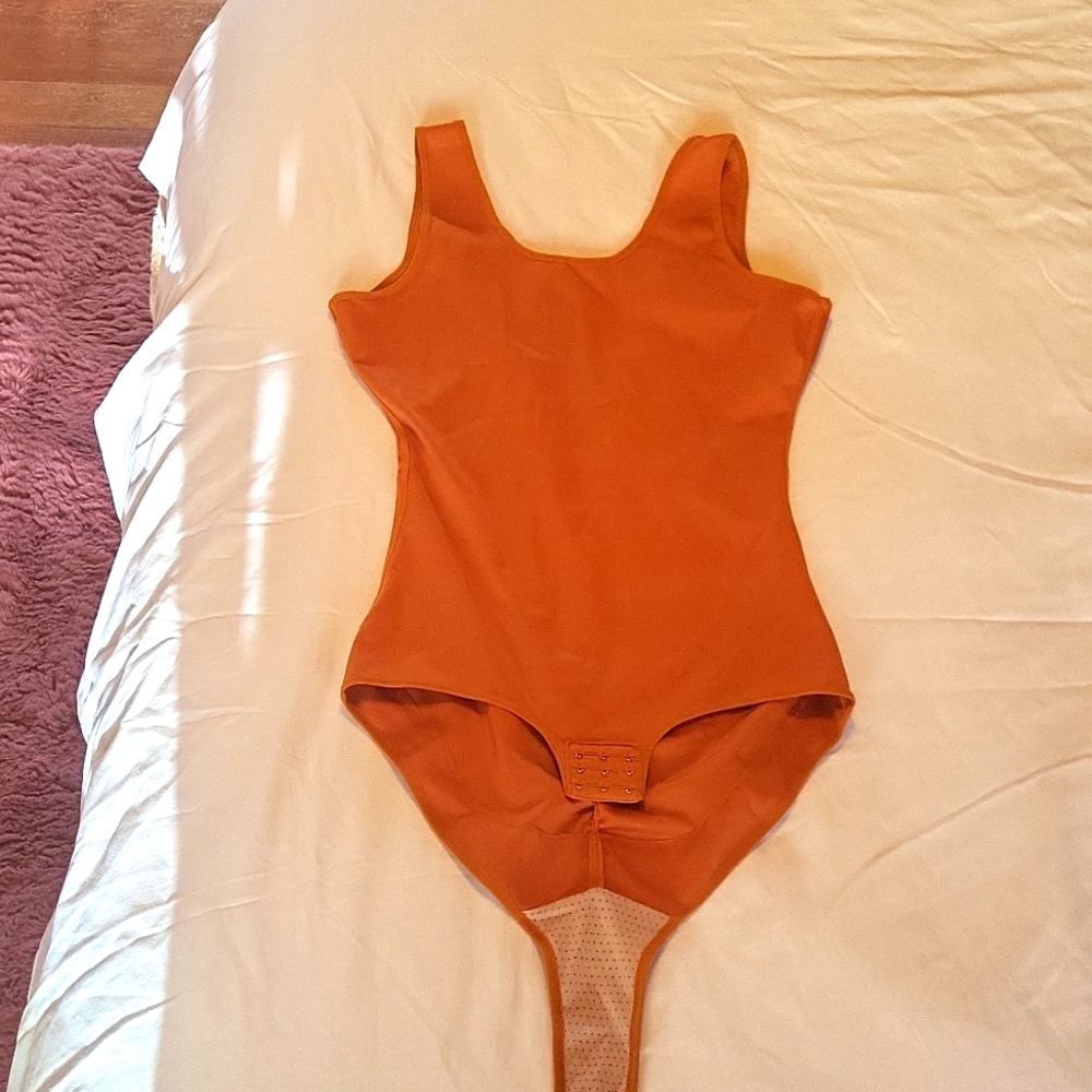Orange bodysuit
